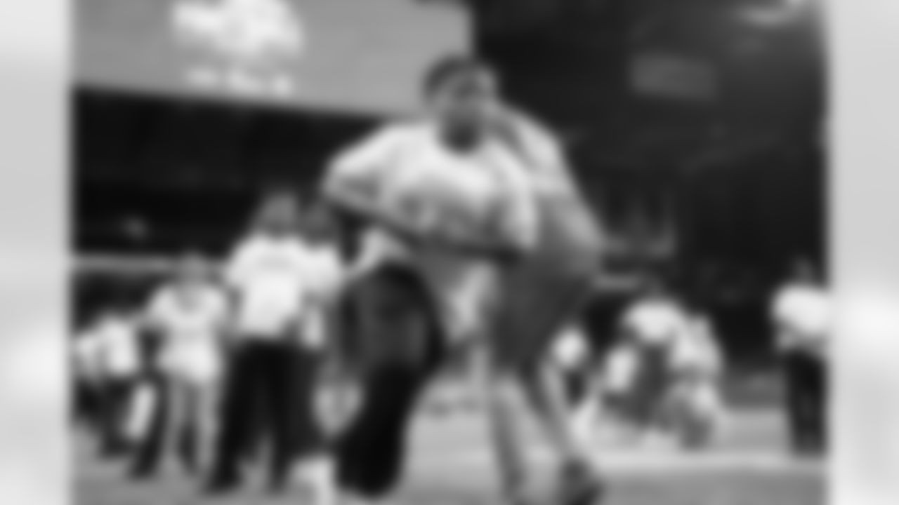 A participant completing a drill during the Inspire Change Football Clinic at Ford Field on Dec. 9, 2025 in Detroit. (Izzy Rincon/Detroit Lions)