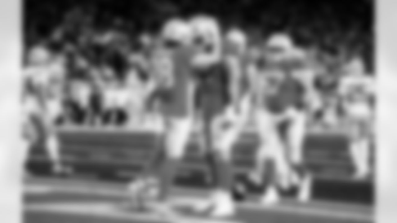 Detroit Lions wide receiver Isaac TeSlaa (18) and Detroit Lions offensive lineman Tate Ratledge (69) celebrate after a touchdown during an NFL football game against the Green Bay Packers on Thursday, Nov. 27, 2025 in Detroit. (Jeff Nguyen/Detroit Lions via AP)