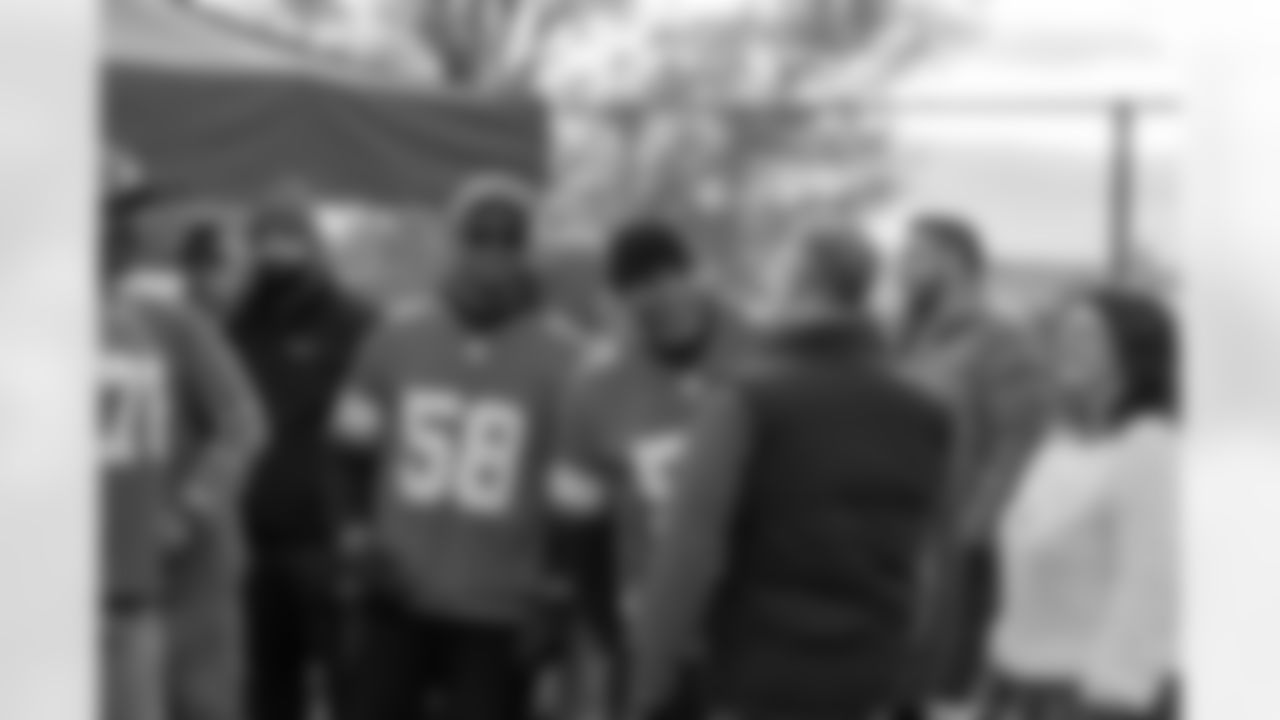 Lions Legend George Jamison (58) and Lions Legend Tim Walton (57) during a Thanksgiving meal distribution event at the Detroit Lions Academy on Nov. 19, 2025 in Detroit. (Carl Jones II/Detroit Lions)