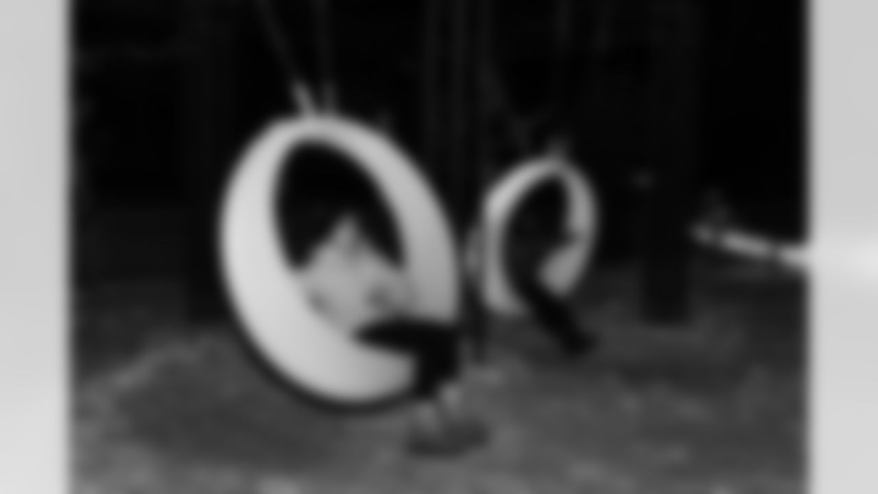 A Cub Club member swings during the Cub Club Wild Lights event at the Detroit Zoo on Dec. 10, 2025 in Royal Oak, Mich. (Stephanie VanWagoner/Detroit Lions)