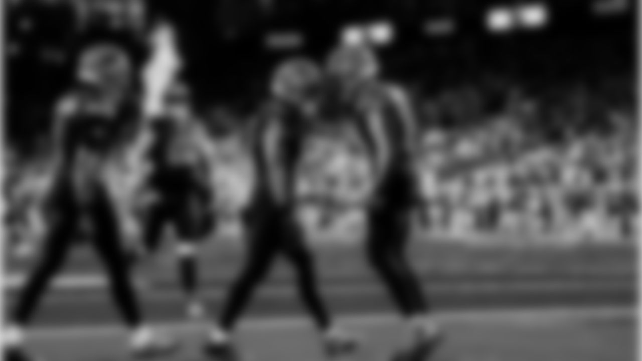 Detroit Lions running back Jahmyr Gibbs (0) and Detroit Lions wide receiver Amon-Ra St. Brown (14) celebrate after a touchdown during an NFL football game against the New York Giants on Sunday, Nov. 23, 2025 in Detroit. (Jeff Nguyen/Detroit Lions via AP)