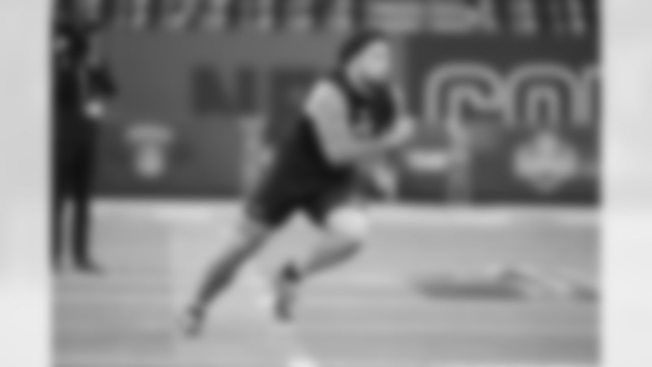 Texas A&M offensive lineman Chase Bisontis (05) runs a drill at the NFL football scouting combine in Indianapolis, Sunday, March 1, 2026. (AP Photo/Michael Conroy)