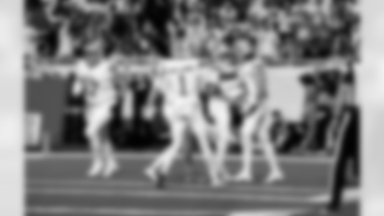 Detroit Lions wide receiver Jameson Williams (1), Detroit Lions running back Jahmyr Gibbs (0), and Detroit Lions wide receiver Isaac TeSlaa (18) celebrate after a touchdown during an NFL football game against the Dallas Cowboys on Thursday, Dec. 4, 2025 in Detroit. (Jeff Nguyen/Detroit Lions via AP)