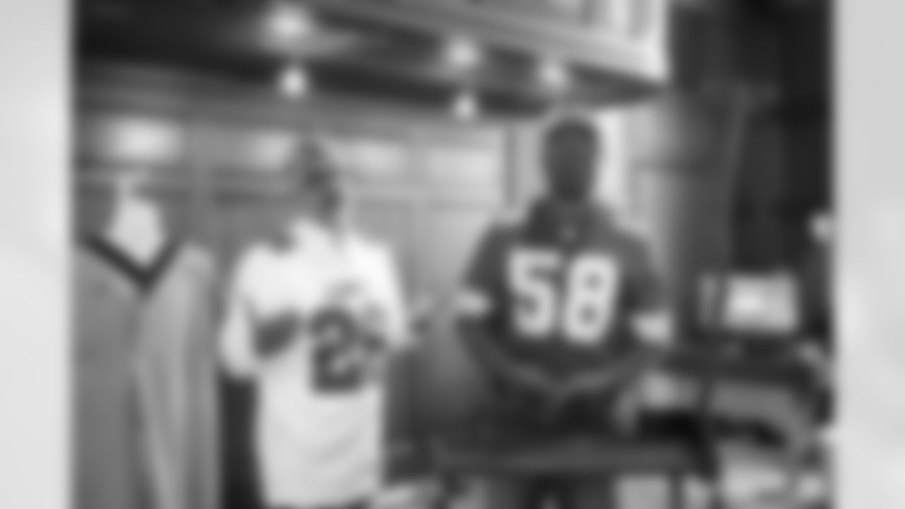 HFH employee Vikas Reman and Lions Legend George Jamison (58) demonstrating a product during a Detroit Lions Academy health and wellness field trip at the Henry Ford Health campus on Feb. 27, 2026 in Detroit. (Izzy Rincon/Detroit Lions)