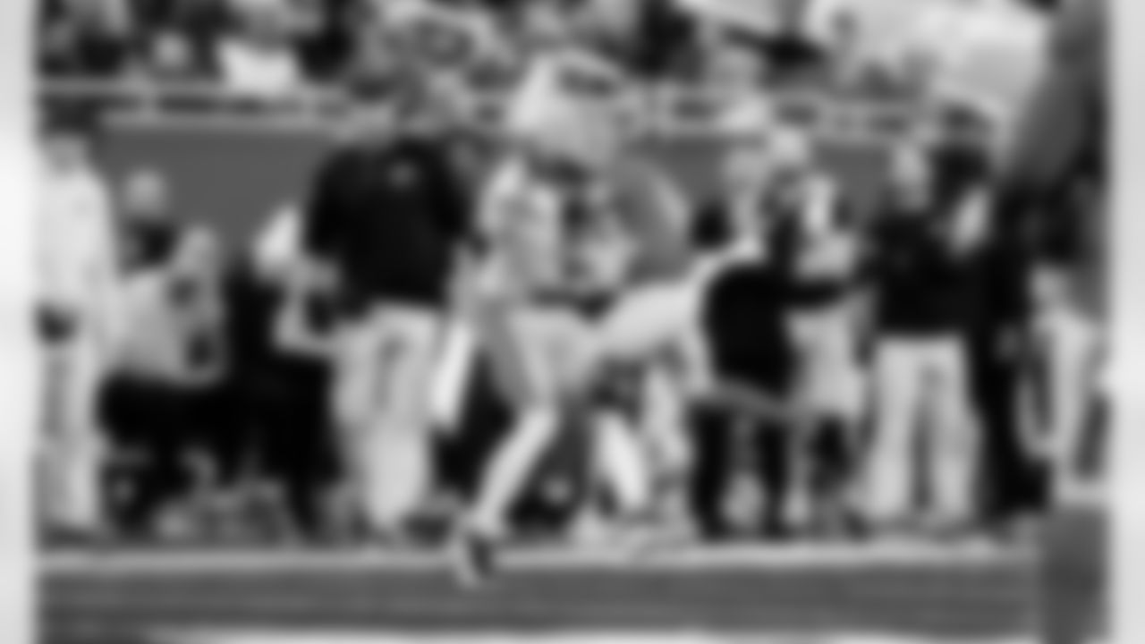 Detroit Lions cornerback Amik Robertson (21) breaks up a pass during an NFL football game against the Green Bay Packers on Thursday, Nov. 27, 2025 in Detroit. (Jeff Nguyen/Detroit Lions via AP)