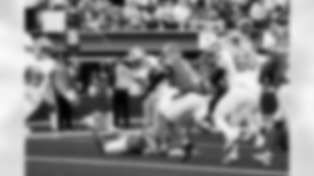 Detroit Lions wide receiver Amon-Ra St. Brown (14) scores a touchdown during an NFL football game against the Los Angeles Rams on Sunday, Dec. 14, 2025 in Inglewood, Calif. (Jeff Nguyen/Detroit Lions via AP)