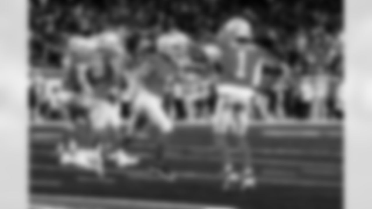 Detroit Lions running back David Montgomery (5) and Detroit Lions wide receiver Jameson Williams (1) after a touchdown during an NFL football game against the Green Bay Packers on Thursday, Nov. 27, 2025 in Detroit. (Jeff Nguyen/Detroit Lions via AP)