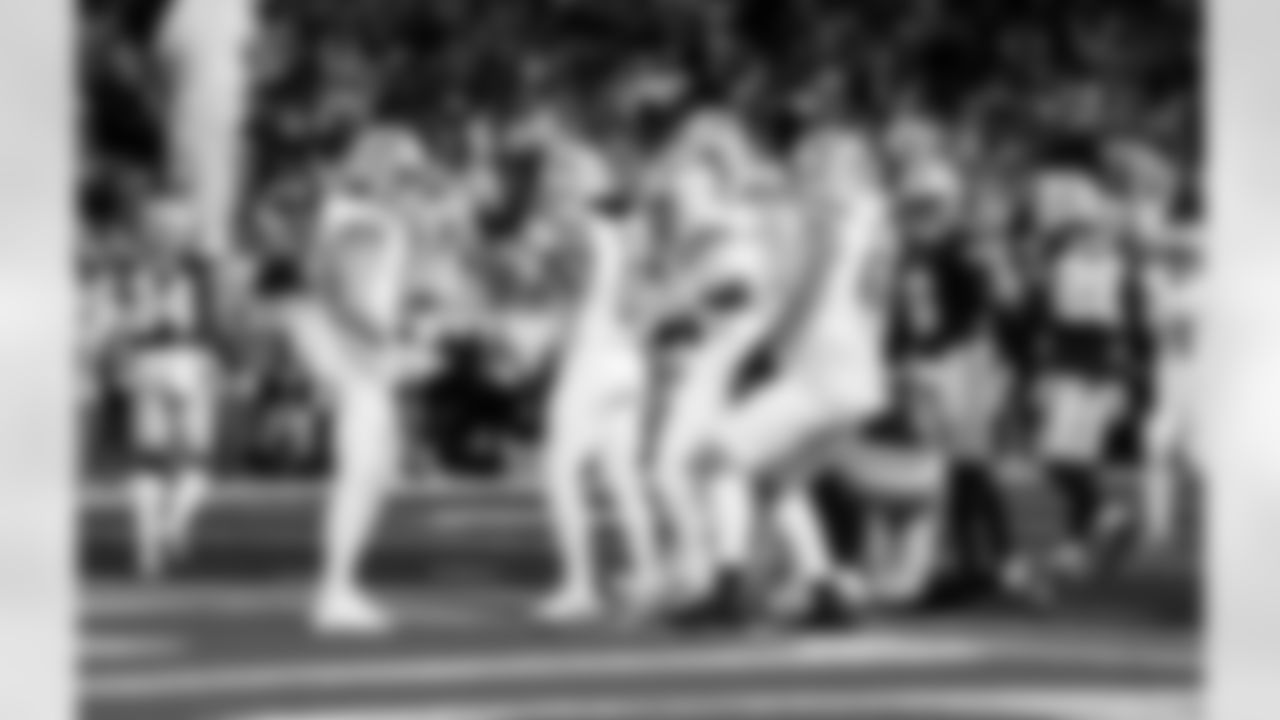 Detroit Lions wide receiver Isaac TeSlaa (18), Detroit Lions running back Jahmyr Gibbs (0), and Detroit Lions offensive lineman Tate Ratledge (69) celebrate after scoring a touchdown during an NFL football game against the Dallas Cowboys on Thursday, Dec. 4, 2025 in Detroit. (Jeff Nguyen/Detroit Lions via AP)