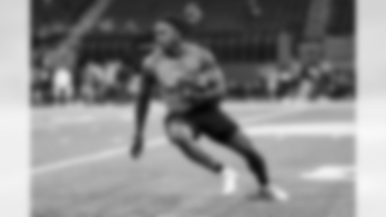Michigan defensive lineman Jaylen Harrell participates in a drill during the 2024 NFL Scouting Combine on Thursday, February 29, 2024 in Indianapolis, Indiana.