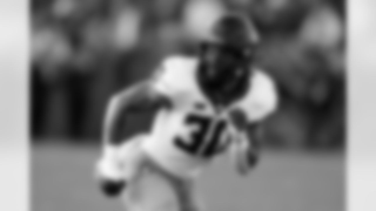 CollinOliver-AP Photo:Charlie Neibergall, File