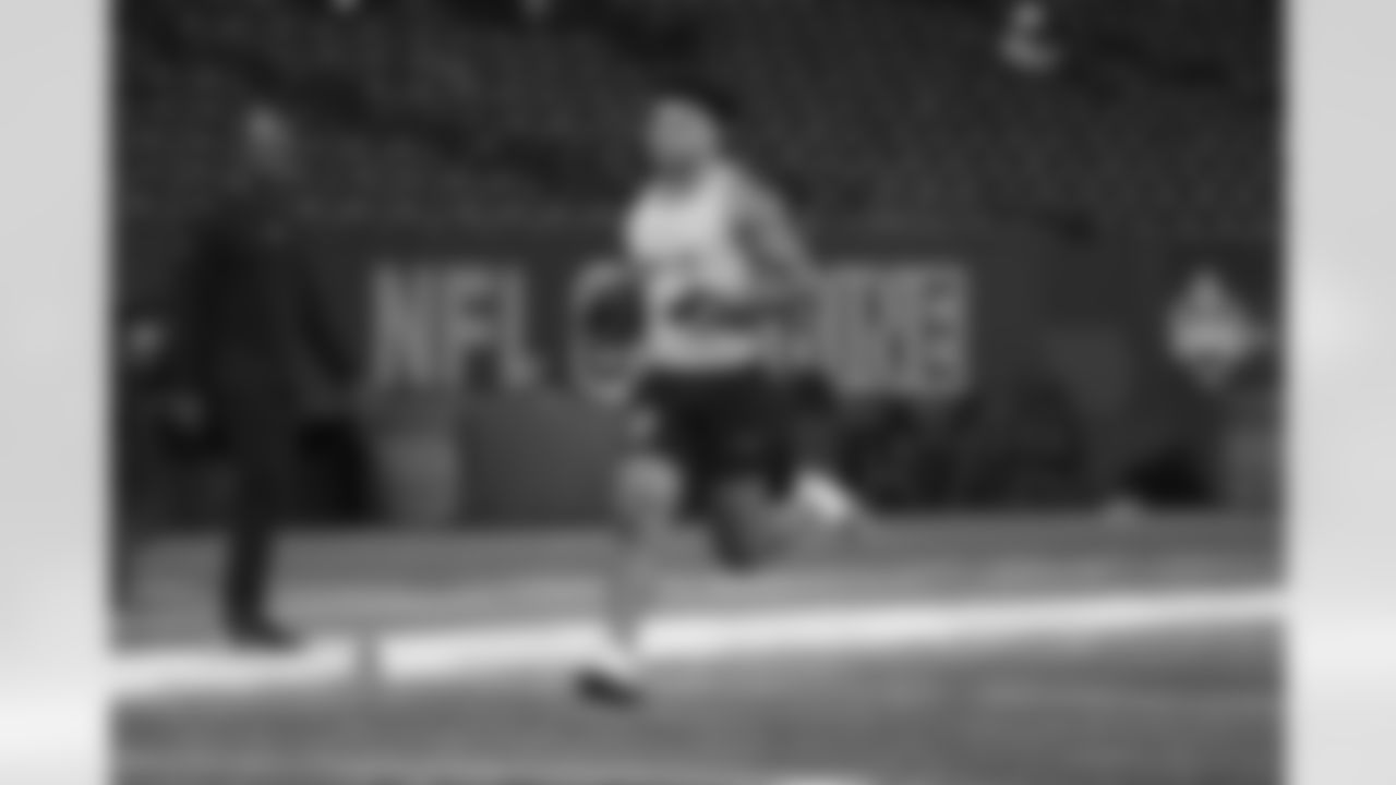Louisville running back Isaac Guerendo participates in a drill during the 2024 NFL Scouting Combine on Saturday, March 2, 2024 in Indianapolis, Indiana.