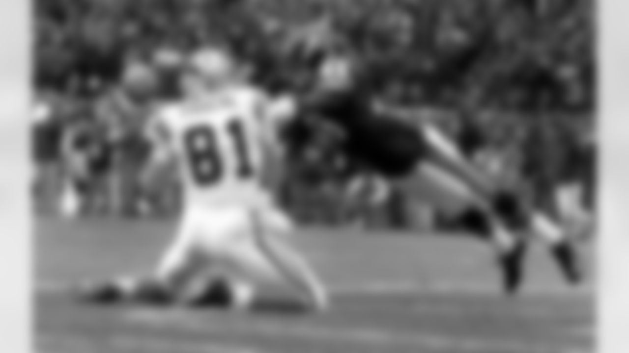 Chicago Bears safety Chris Harris (46) dives to knock away a pass in the end zone intended for  Carolina Panthers' Ricky Proehl (81) to deny a touchdown during the fourth quarter on Sunday, Nov. 20, 2005, in Chicago. Carolina had to settle for a field goal on the next play and went on to lose the game 13-3. (AP Photo/Jeff Roberson)