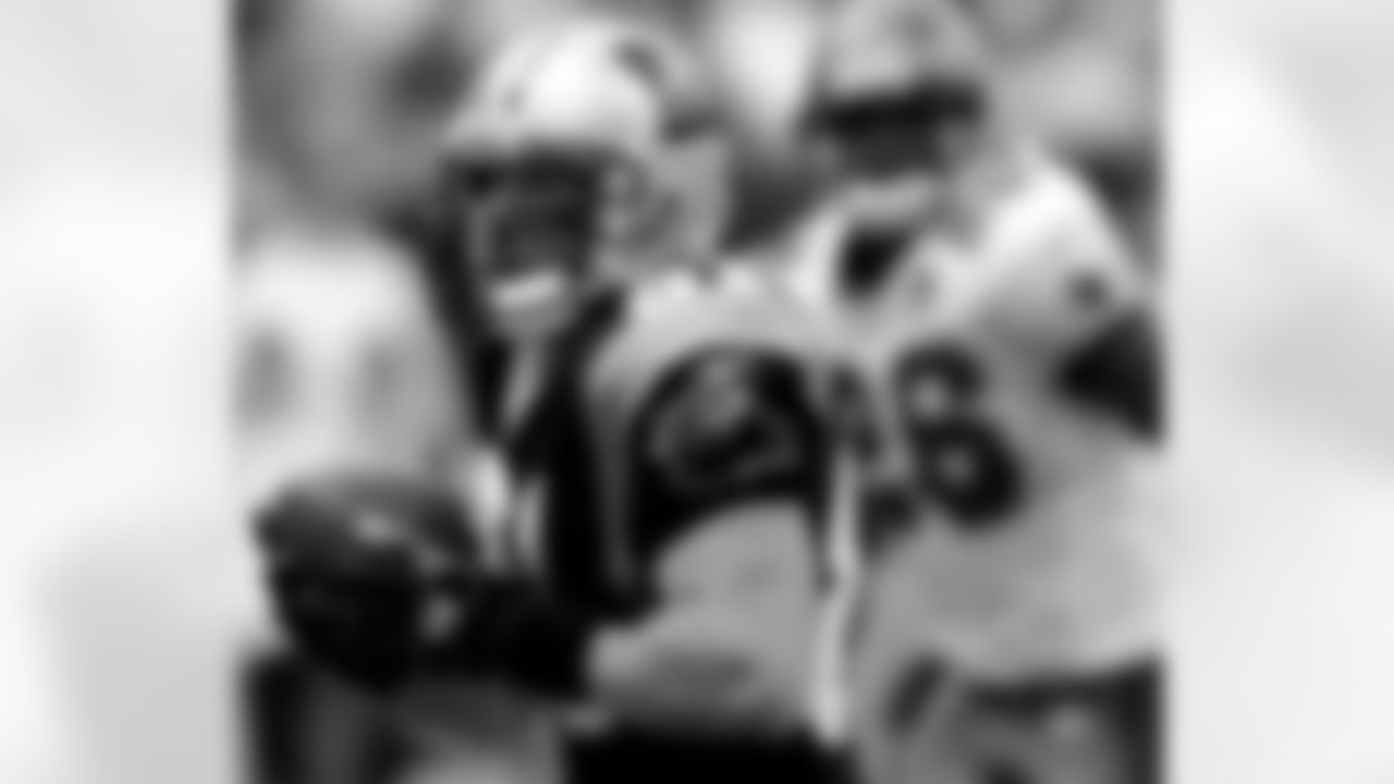 Carolina Panthers wide receiver Ricky Proehl runs away from Tampa Bay Buccaneers safety Will Allen (26) after pulling in a 64-yard reception from quarterback Jake Delhomme during the second quarter Sunday afternoon, Nov. 6, 2005, in Tampa, Fla. (AP Photo/Chris O'Meara)