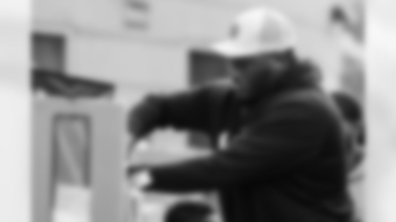 Carolina Panthers defensive end Derrick Brown and Second Harvest Food Bank of Metrolina distribute packages of Thanksgiving food on Tuesday, Nov. 18, 2025 at Hidden Valley Elementary School in Charlotte, NC.