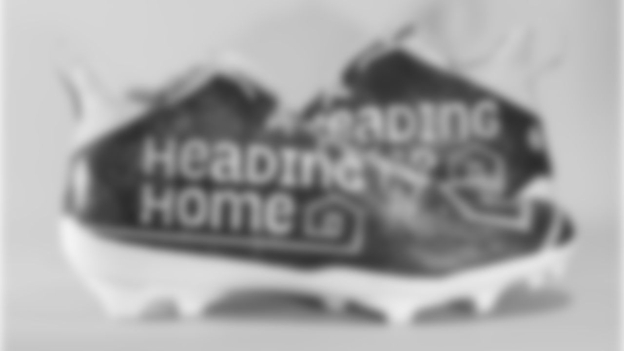 Caedan Wallace's cleats supporting Heading Home.