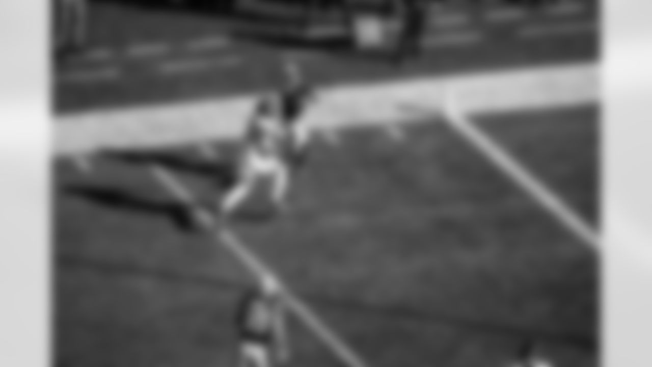 DeMario Douglas catches a 17-yard pass from Drake Maye for a touchdown in the first quarter.