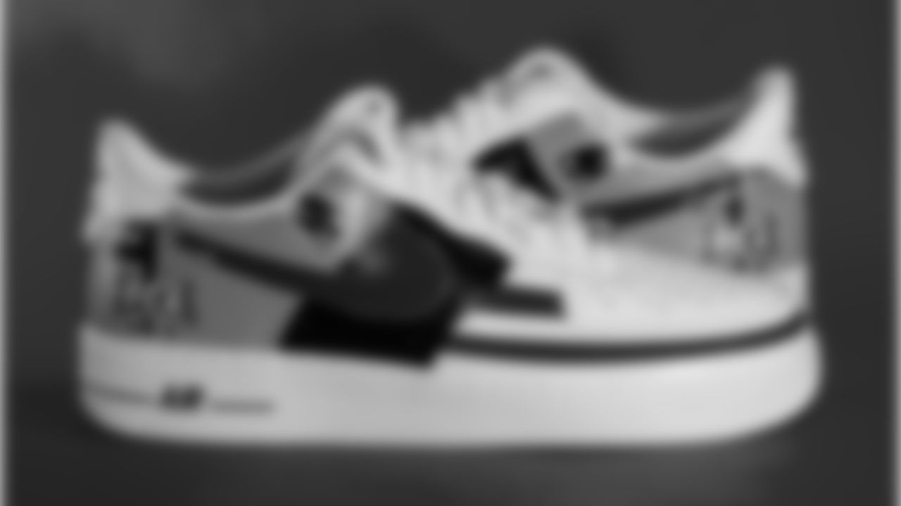 Offensive Assistant Chuckie Keeton's sneakers supporting Fellowship of Christian Athletes.