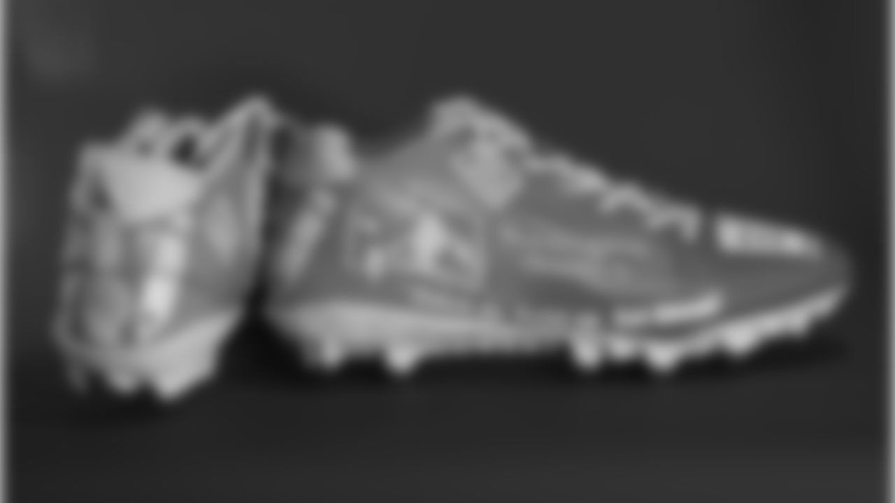 Jack Westover's cleats supporting Morningside Academy.