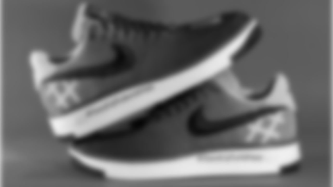 Patriots Chairman and CEO Robert Kraft's custom cleats supporting the Blue Square Alliance.