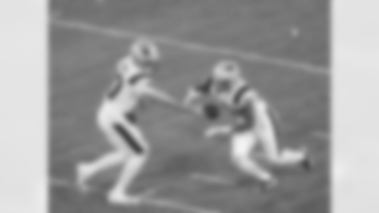 Drake Maye and TreYeyon Henderson. Photo by Lexi Ehle