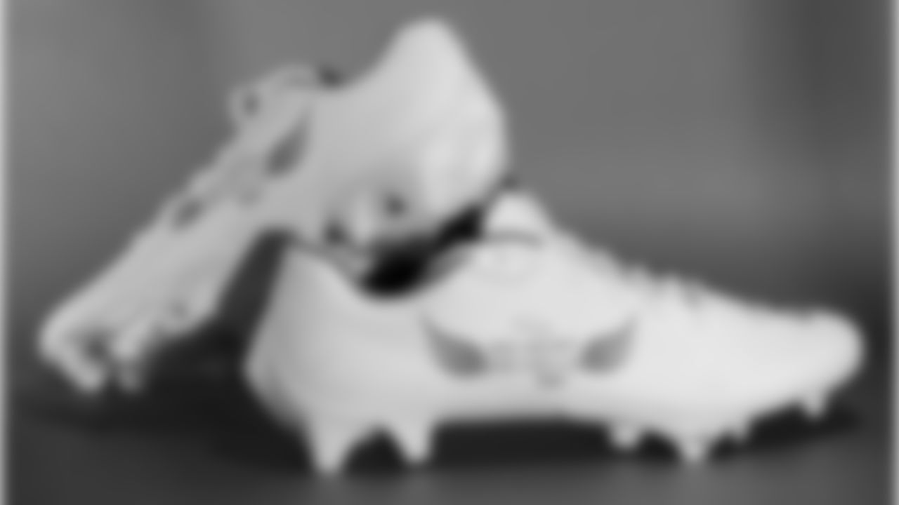 Efton Chism's cleats supporting Big Heart Big Smile.