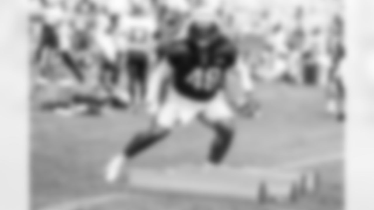 Jahlani Tavai practices at Patriots Training Camp on August 3, 2024