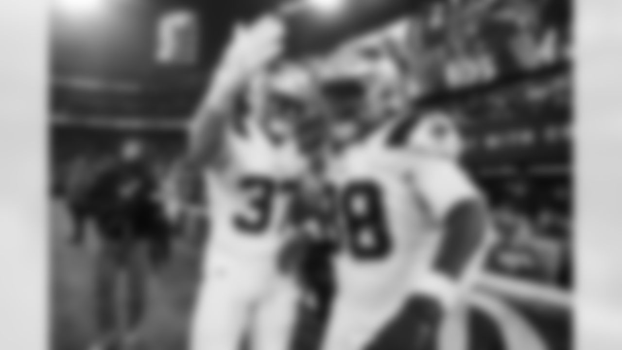 Jack Westover and Rhamondre Stevenson. Photo by Eric J. Adler