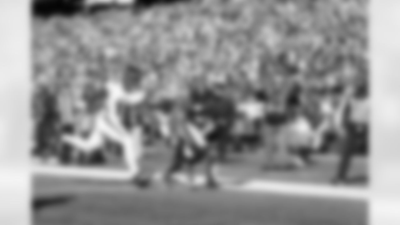 DeMario DouglasDeMario Douglas catches a 17-yard touchdown pass from Drake Maye in the first quarter.