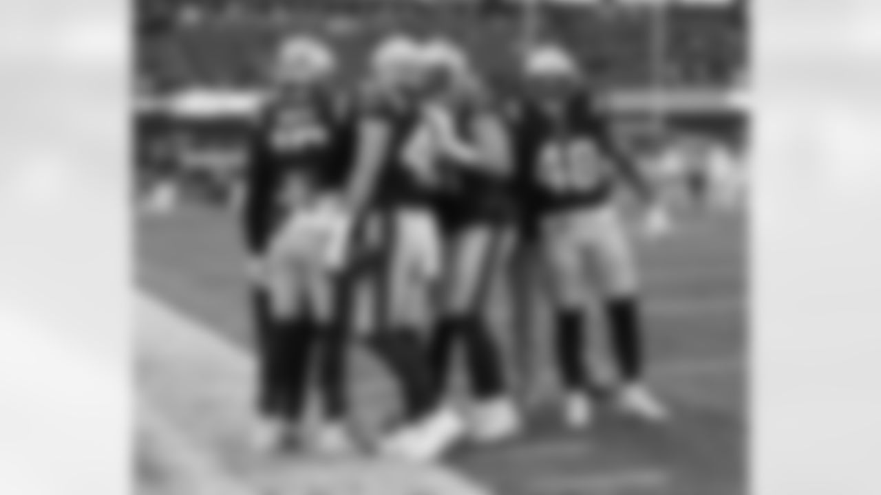 Marte Mapu, Chad Muma and Jahlani Tavai. Photo by Lexi Ehle