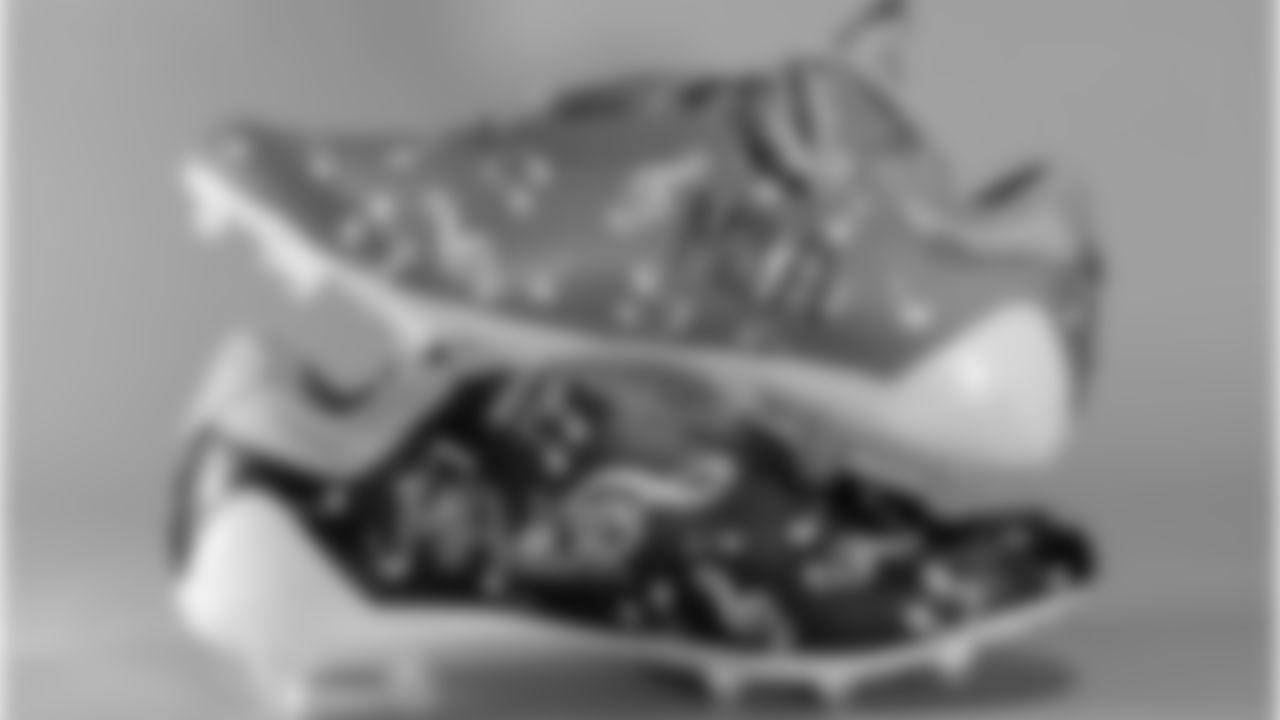 Marcus Jones' cleats supporting Covered By Music Foundation