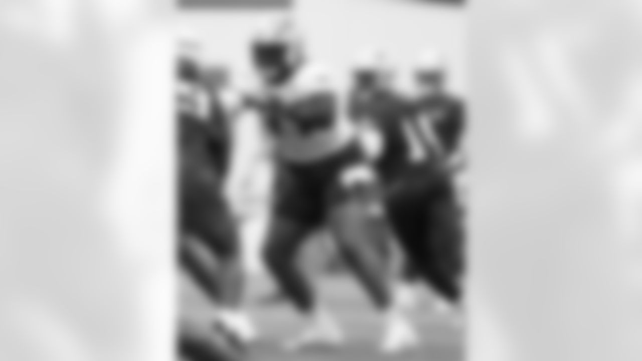 Chukwuma Okorafor practices at Patriots Training Camp on July 24, 2024