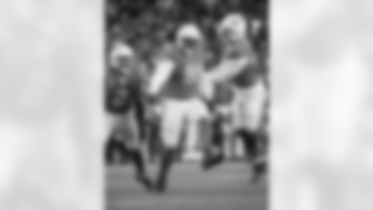 Harold Landry III, Christian Barmore and K'Lavon Chaisson