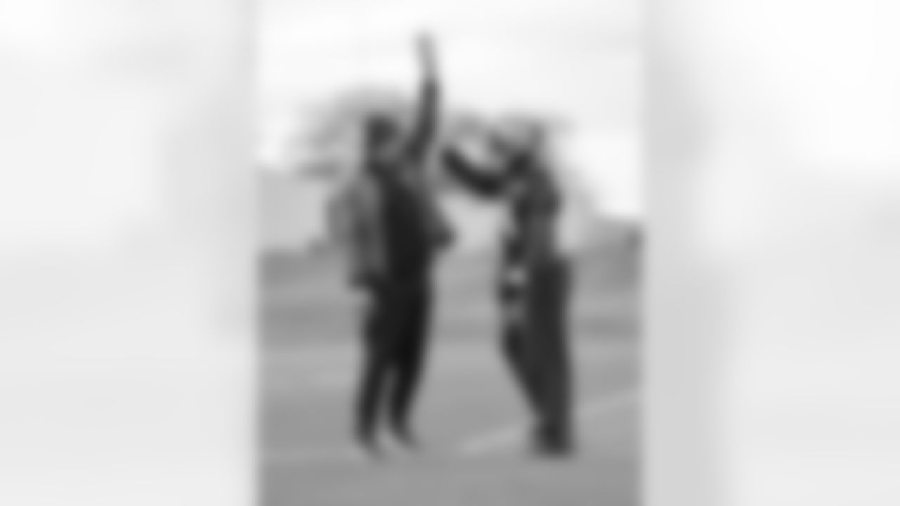 Mike Vrabel and K'Lavon Chaisson