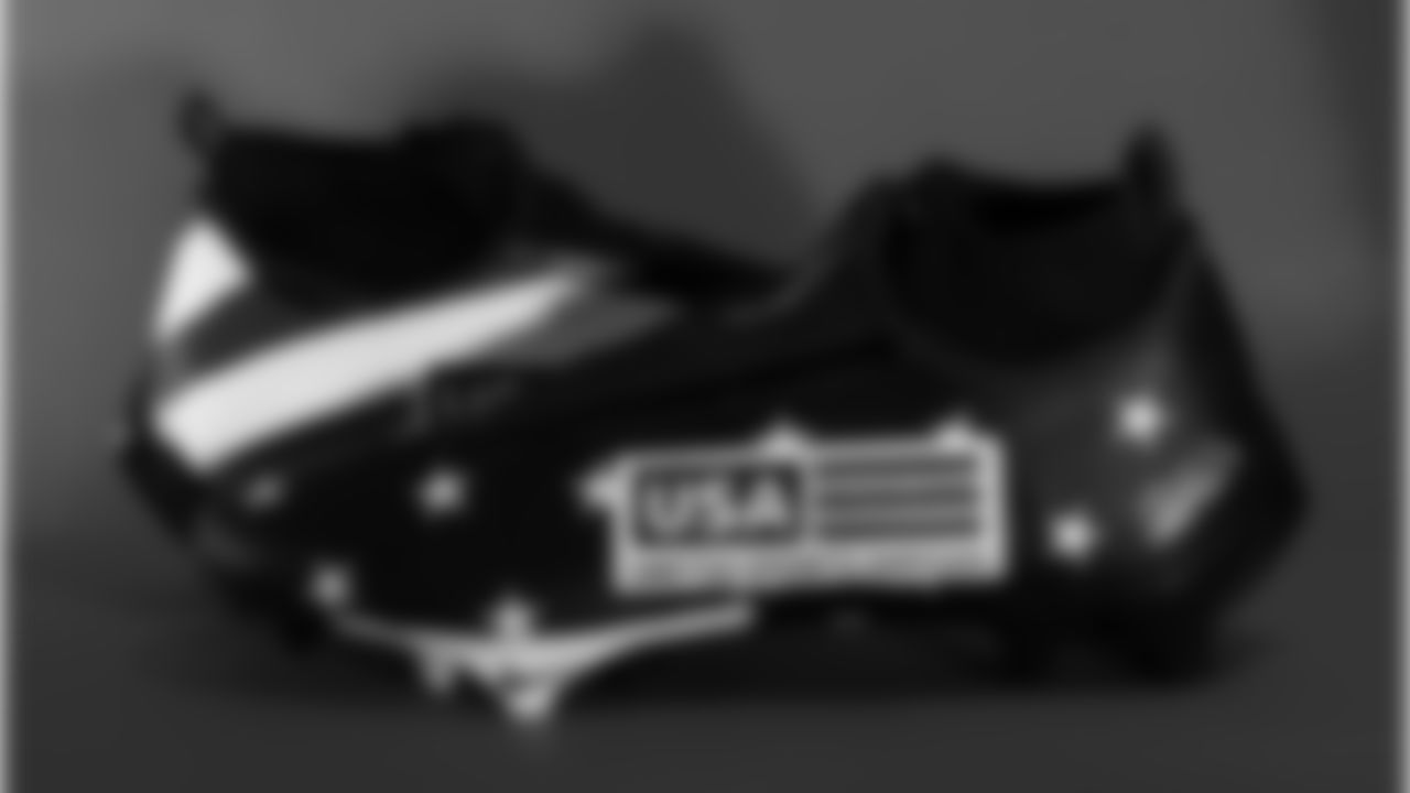 Jaylinn Hawkins cleats supporting United Sports Abroad.