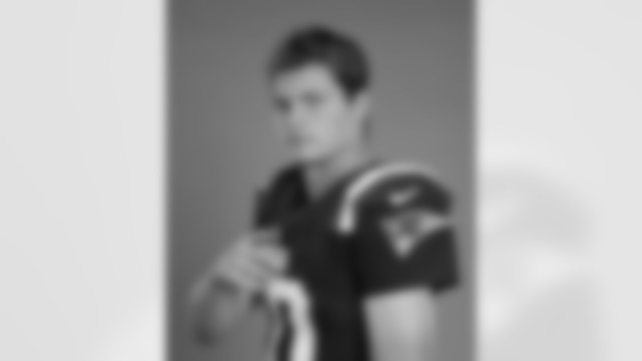 Patriots QB Drake Maye poses during 2025 media day.