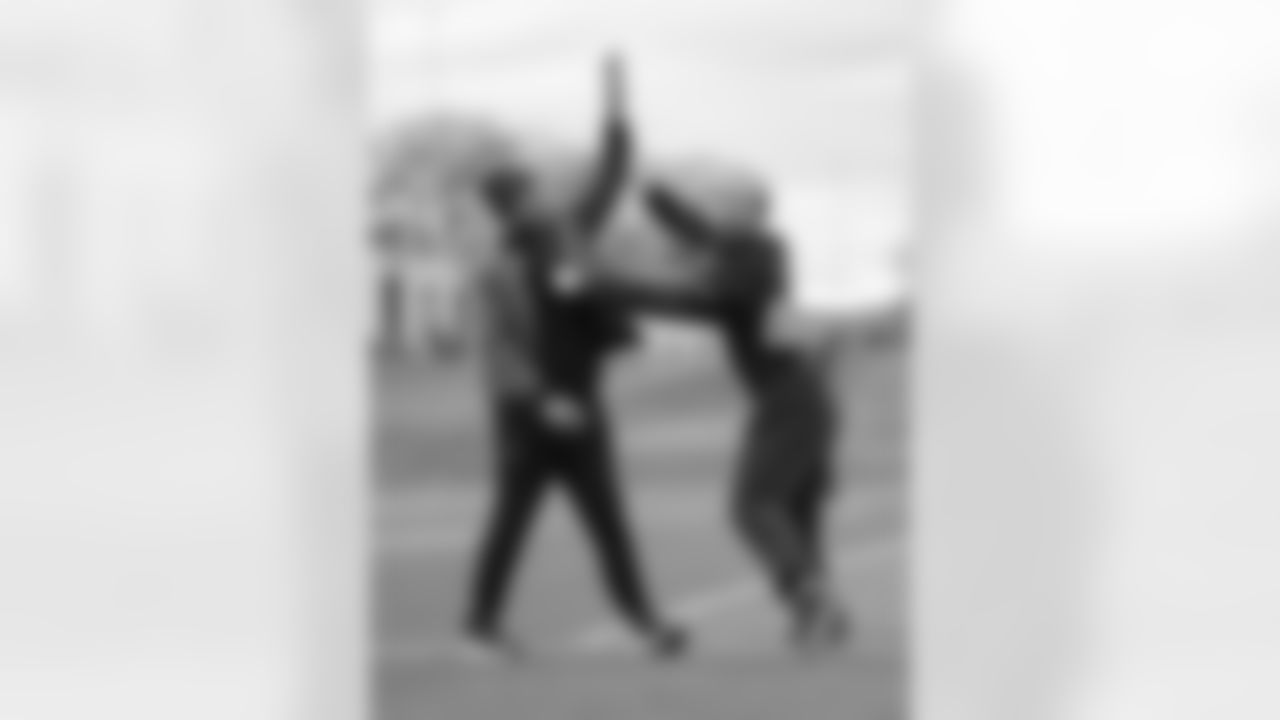 Mike Vrabel and K'Lavon Chaisson