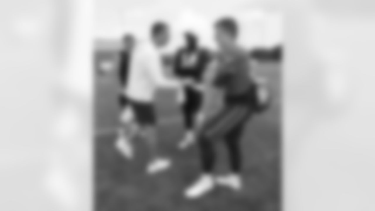 Former Atlanta Falcons QB Matt Ryan meets with Patriots QBs Drake Maye, Jacoby Brissett and Bailey Zappe during Patriots Training Camp on August 2, 2024.