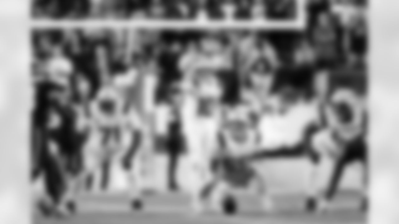 Drake Maye & Garrett Bradbury. Photo by Greg M. Cooper