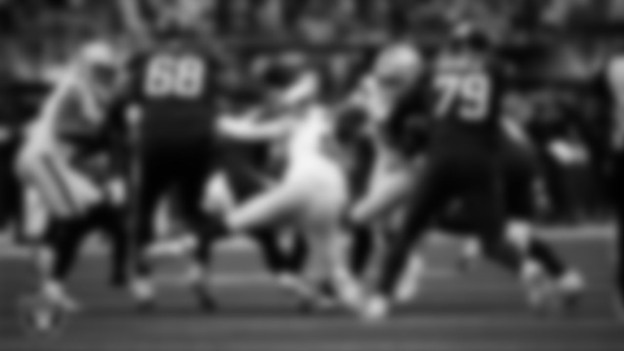 Las Vegas Raiders defensive end Maxx Crosby (98) sacks the quarterback during the regular season away game against the Los Angeles Chargers at SoFi Stadium.