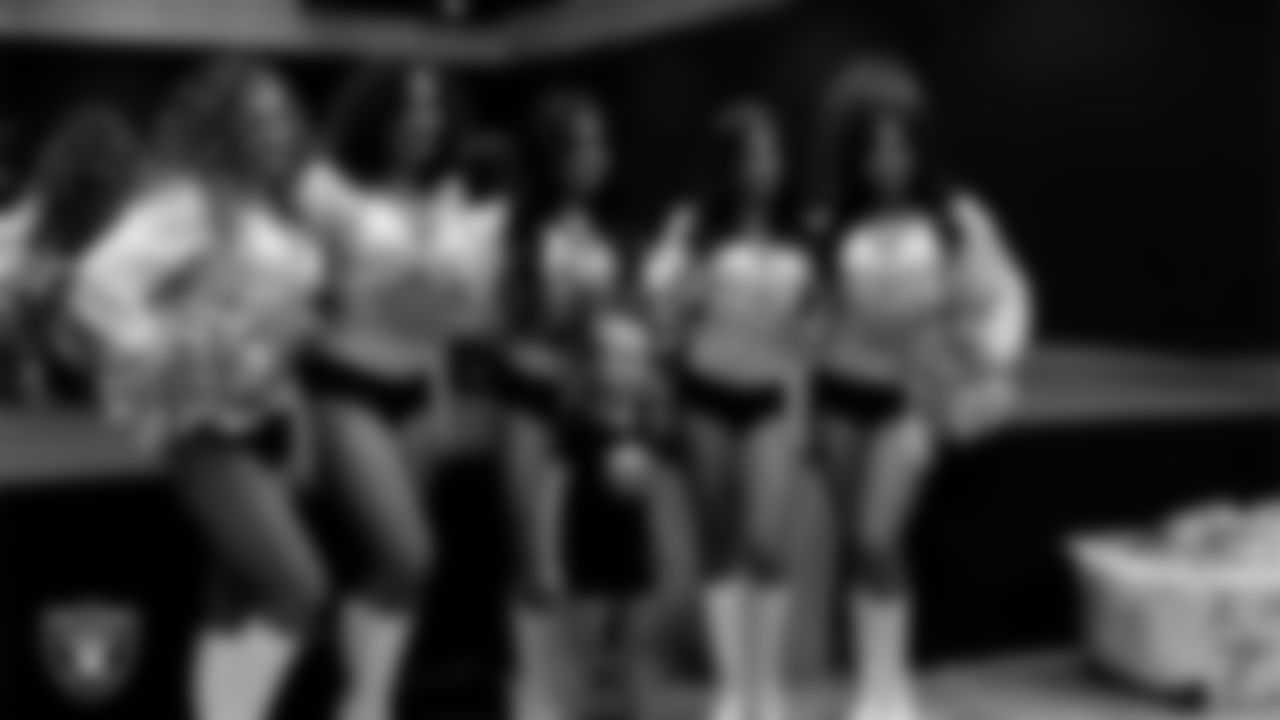 Raiderettes Lexie, Makenna, Sloane, Ashtin and Maddie pose for a photo with a dancer during day three of summer camp at The Studio.
