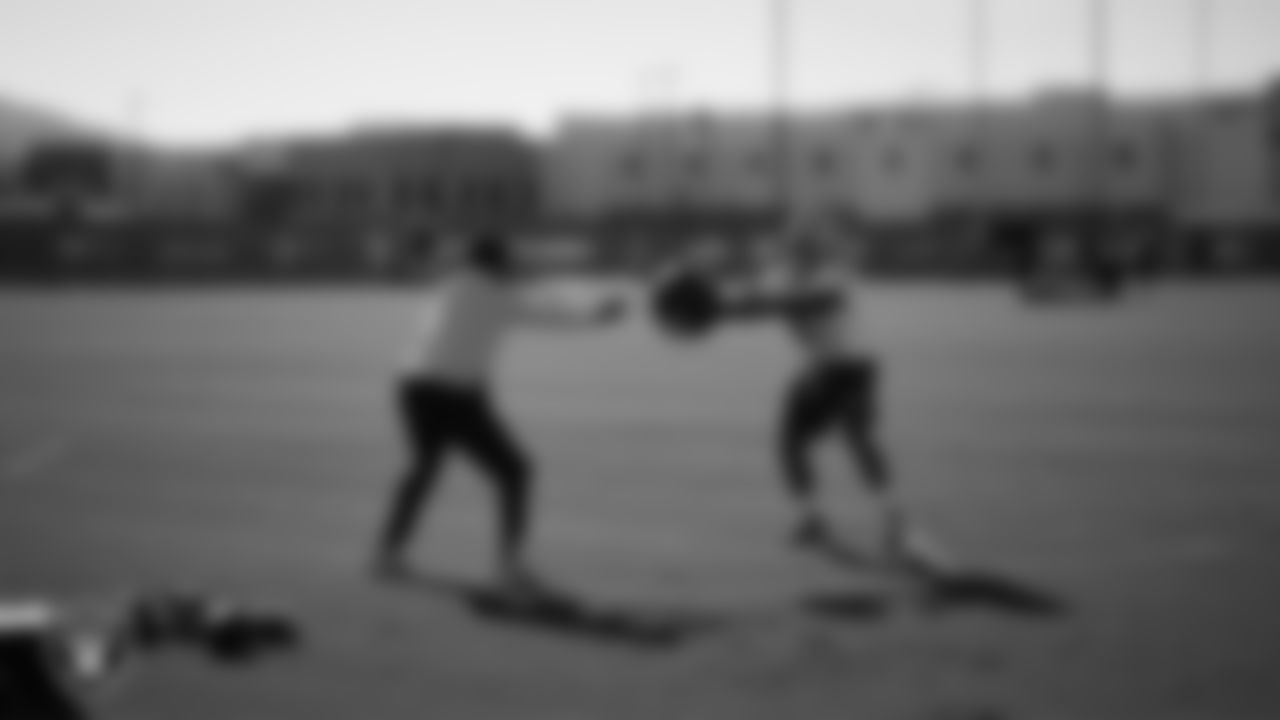 Las Vegas Raiders running backs coach Deland McCullough and running back Ashton Jeanty (2) during practice at Intermountain Health Performance Center.