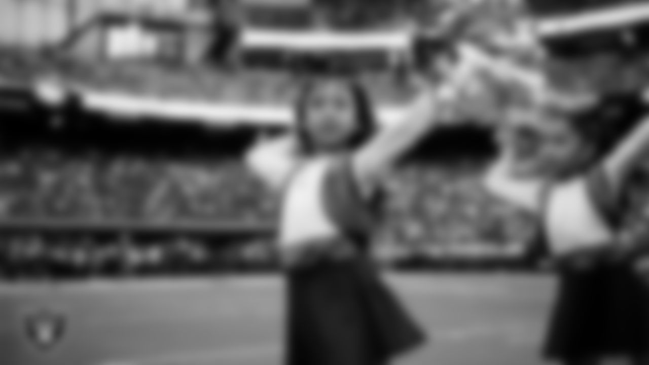 Junior Raiderettes perform on the field before the preseason home game against the San Francisco 49ers at Allegiant Stadium.
