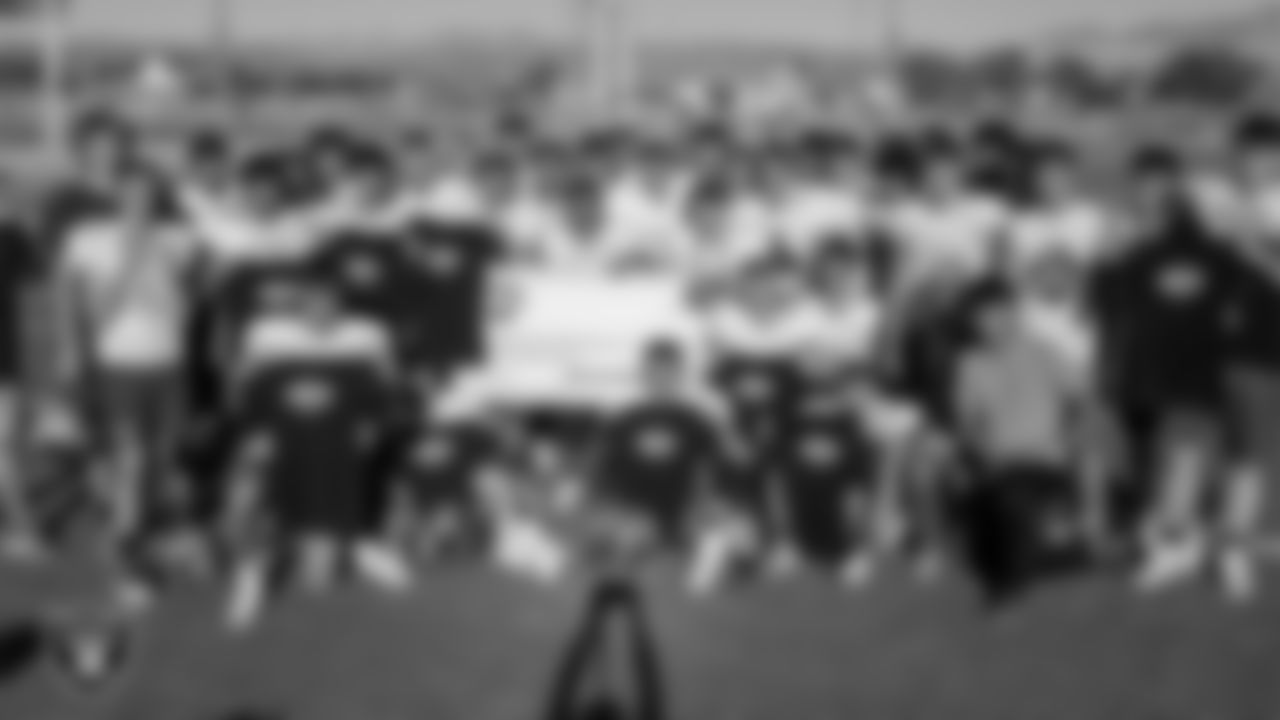 The Moapa Valley High School football team poses for a photo during practice at Moapa Valley High School.