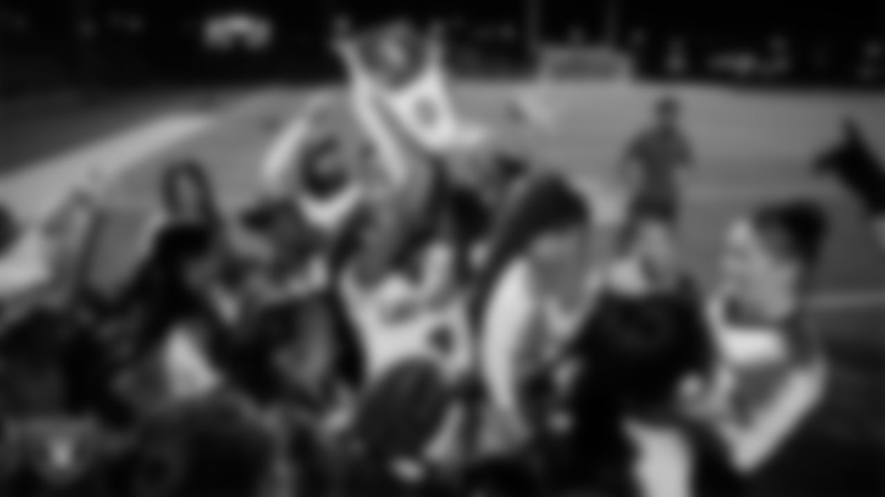 The Las Vegas High School flag football team celebrates after winning the Las Vegas Raiders' High School Flag Football Showcase game at Mater East Academy.