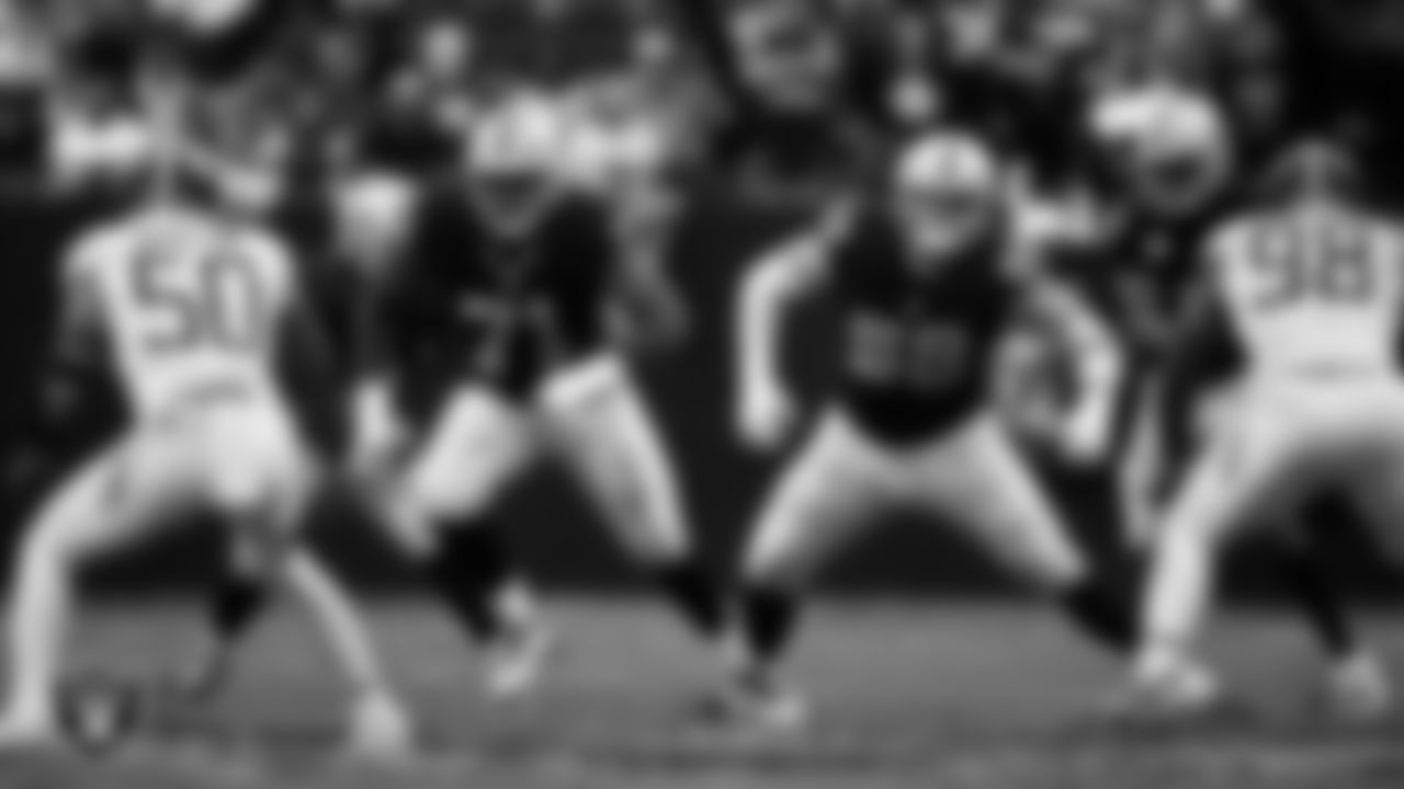 Las Vegas Raiders tackle DJ Glaze (71) and guard/center Jackson Powers-Johnson (58) block during the regular season home game against the Tennessee Titans at Allegiant Stadium.
