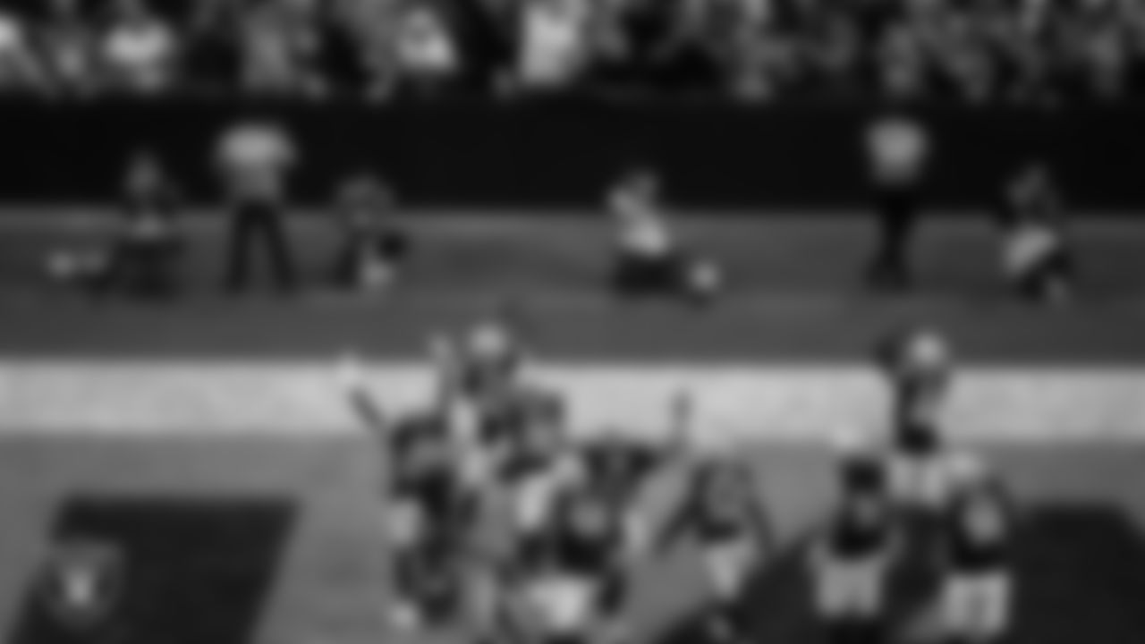 Las Vegas Raiders safety Isaiah Pola-Mao (20) celebrates with teammates after intercepting a pass during the regular season home game against the Jacksonville Jaguars at Allegiant Stadium.