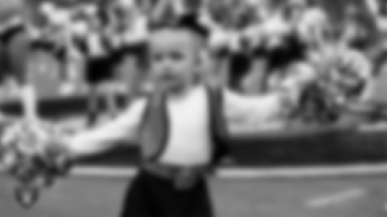 Junior Raiderettes perform on the field before the preseason home game against the San Francisco 49ers at Allegiant Stadium.