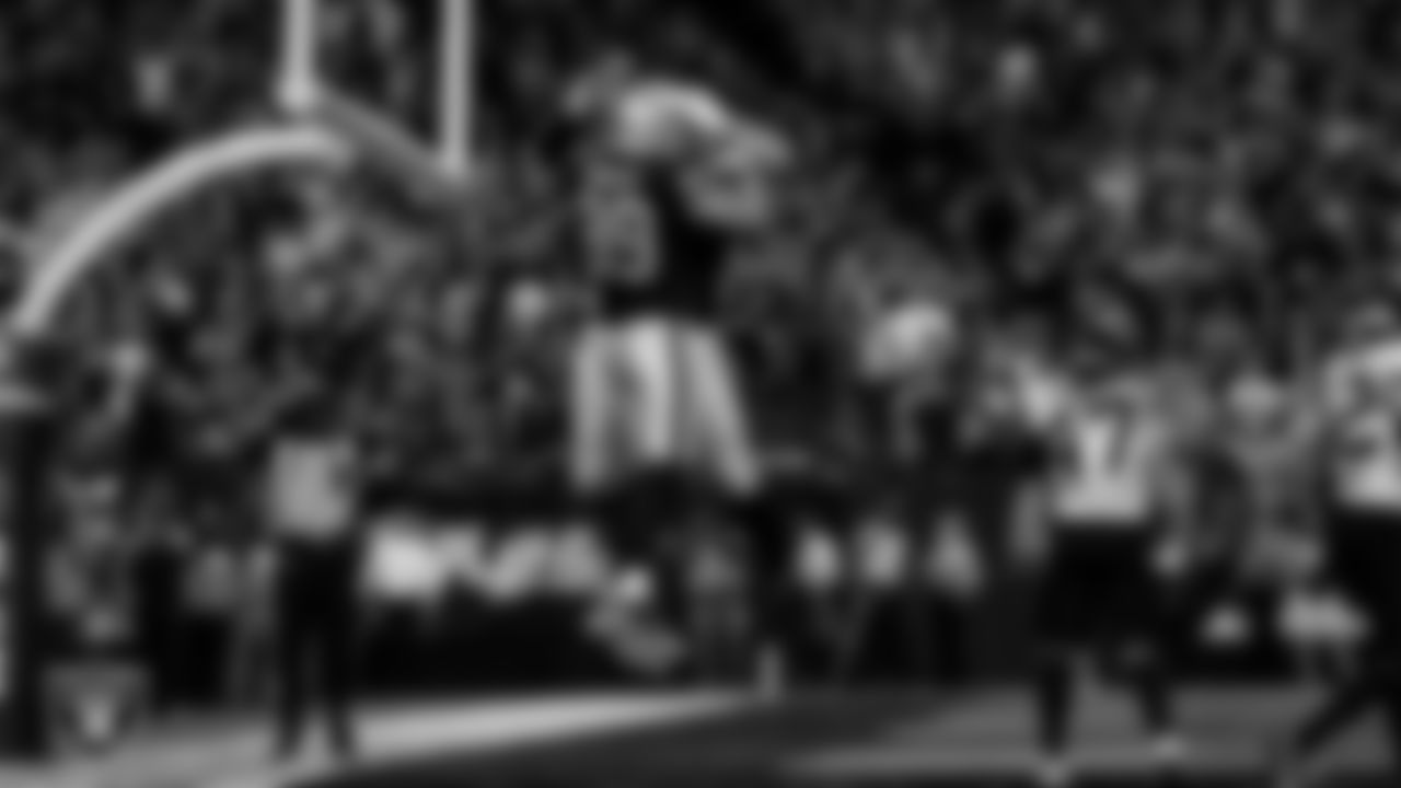 Las Vegas Raiders tight end Brock Bowers (89) celebrates with guard/center Jackson Powers-Johnson (58) after making a 2-yard touchdown catch during the regular season home game against the Jacksonville Jaguars at Allegiant Stadium.