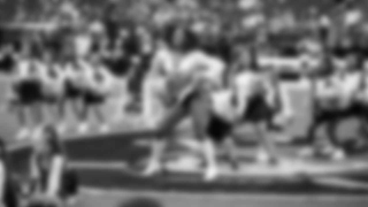 Raiderette Makenna and Junior Raiderettes perform on the field before the preseason home game against the San Francisco 49ers at Allegiant Stadium.