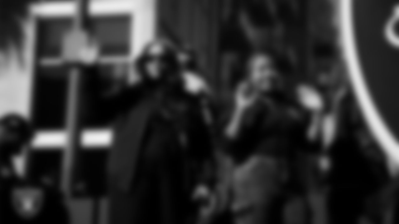 Las Vegas Raiders manager of premium service Demi Lobo and coordinator of event operations Charity Mackey during the Martin Luther King Jr. Day Parade in Downtown Las Vegas.